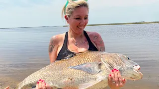 Catching HUGE BLACK DRUM with some slot RED DRUM action.