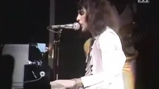 Freddie Mercury, young, playing gracefully on the piano and making us all cry
