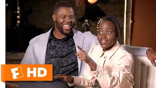 Lupita Nyong'o & Winston Duke Compare Jordan Peele & Ryan Coogler's Directing Styles | Us Interview