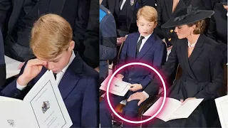 Prince GEORGE wipes away TEARS during the Queen’s funeral Mum puts comforting hand on George's knee