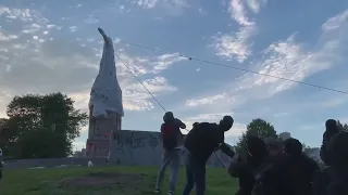 Large protest erupts at Christopher Columbus statue in Grant Park