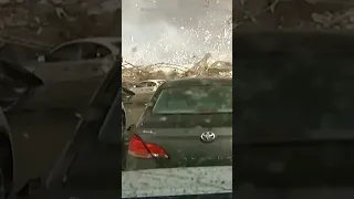 Dashcam video: Tornado destroys building