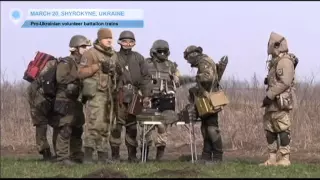 Mariupol Defense: Ukraine's Azov battalion trains near Mariupol ready to defend city