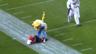 Mascot makes big tackle on kid