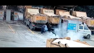 Exploding tyre sends worker flying into the air