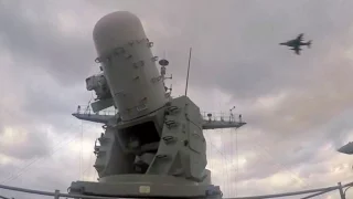 Navy CIWS Gun System Locks Onto Incoming Aircraft