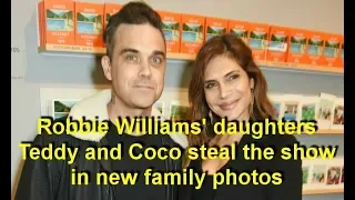 Robbie Williams' daughters Teddy and Coco steal the show in new family photos