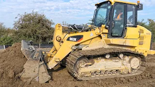 Cat 963K Loading Trucks