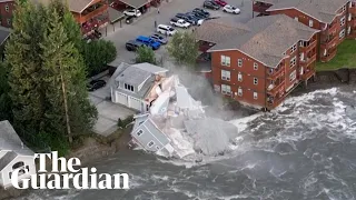 Drone footage shows moment house collapses into river in Alaska, US