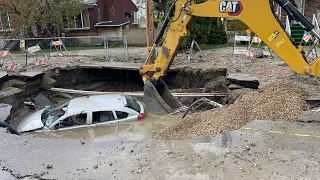 Car swallowed by Salt Lake City water main break