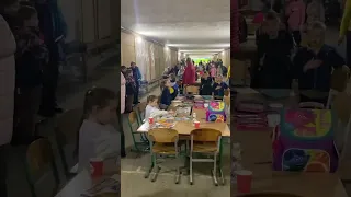 Ukrainian children singing the anthem in a shelter during the russian missile strike
