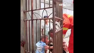 Toddler rescued after his head got trapped in gate| CCTV English