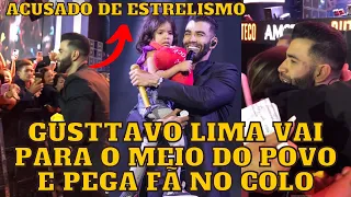 Gusttavo Lima DESCE do Palco, pega FÃ no COLO e ainda dizem que ele é “Estrela”