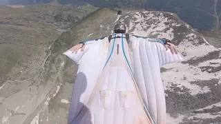 Daredevil Glides Down Mountain Side While Being Upside Down