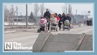 Mariupol residents flee besieged city: 'We are trying to survive somehow'