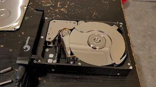 Seagate 8TB 7200RPM drive opened lid, what happens when you plug it in and turn it on?