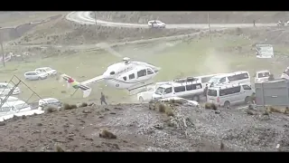 Helicopter hits power lines.