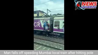 Man falls off speeding Mumbai local train after hitting pole @newsuniversity6418