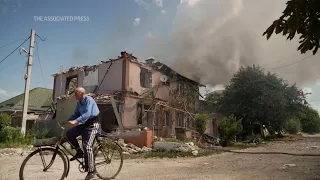 Russian shelling destroys houses in Kherson