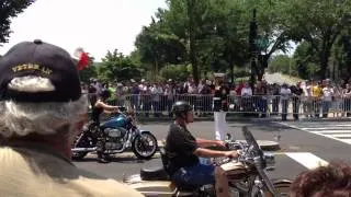 A female Army Soldier stops her bike during Rolling Thunder XXV t