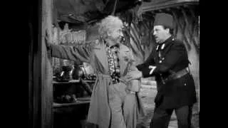 Harpo Holding Up The Building Gag - The Marx Brothers