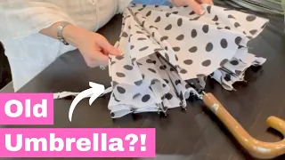 She grabs an umbrella for this genius decor hack!