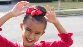 Ballerina Bun Tutorial on Naturally Curly Hair