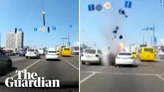 Missile debris narrowly misses cars in Kyiv