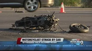 Good samaritans help motorcyclist struck by car