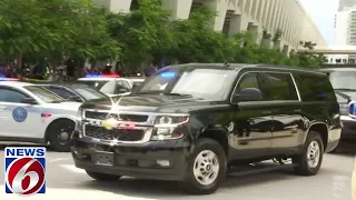 Trump supporters cheer wildly as he arrives at Miami courthouse, while others protest