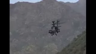 Apache attack helicopter in action