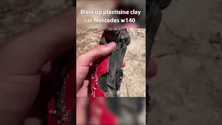 Exploding scale Mercedes W140 of Plasticine Clay