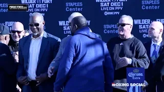 RIDDICK BOWE CONFRONTS LENNOX LEWIS AFTER THEY EXCHANGE WORDS AT HEAVYWEIGHT LEGENDS EVENT