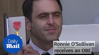 Ronnie O'Sullivan collects his OBE at Buckingham Palace - Daily Mail