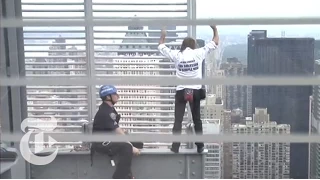 Man Scales Times Building | The New York Times