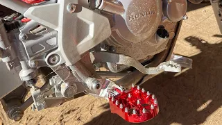 Installing aftermarket foot pegs on 2023 Honda dirt bikes