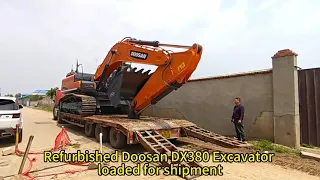 Refurbished Doosan DX380 excavator, loaded for shipment
