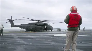 US Navy MH-53E Sea Dragon landing on USS Gerald R. Ford