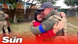 Moment Ukrainian soldier reunites with mother after liberating town