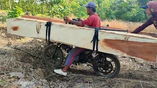 wooden motorcycle taxi skills carrying large logs using a homemade motorbike