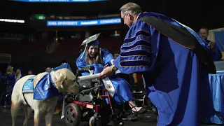 Service Dog Joins Student on Stage at Commencement