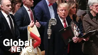 President Trump and Melania Trump attend Christmas Eve service at the National Cathedral