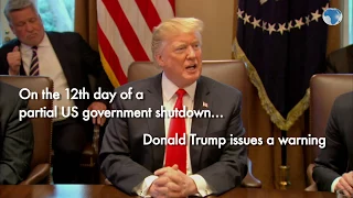 President Trump issues a warning on the 12th day of a partial US government shutdown