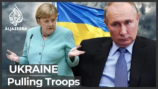 Merkel urges Putin to pull troops back from Ukraine border