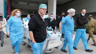 Recovered COVID-19 Patient on ECMO for Three Months Goes Outside for the First Time