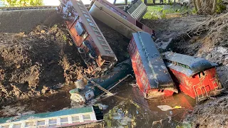 PASSENGER TRAIN CRASHES INTO MUD