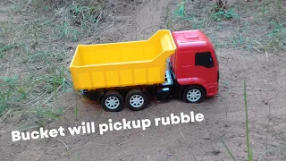 Bucket will pickup rubble.