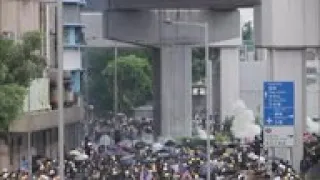 Tear gas fired as HKong activists defy protest ban