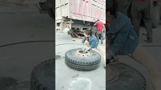 Female car mechanic changes tires , Cute  girl changes car tires # 499