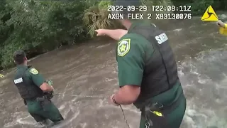 Orange County deputies rescue woman from car in flooded road after Ian